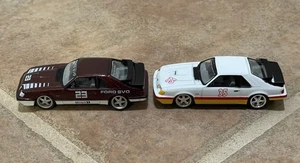 LOT (2) 1986 Ford Mustang SVO Foxbody Auto World Target Exclusive 4 Pack 1/64 - Picture 1 of 16
