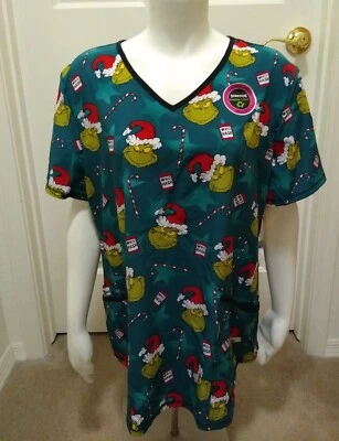 DR. SEUSS CHRISTMAS 🎄"GET YOUR GRINCH ON" GREEN VNECK SCRUB TOP WITH POCKETS 🆕 - Image 1 of 4