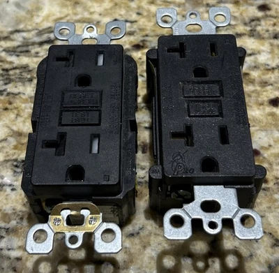 (2)- Leviton 20A 125V GFCI, ONE TAMPER AND THE OTHER ISNT. - Image 1 of 2