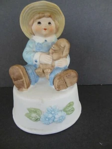 Musical Plays " IT'S A SMALL WORLD"  Figure of Boy Holding Sleeping Puppy Dog - Picture 1 of 6