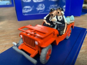 NUOVO modello auto 1/43 TIM STRUPPI Tintin Voiture Willys MB Jeep rossa IMBALLO ORIGINALE Hergé - Foto 1 di 6