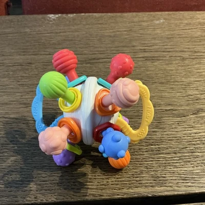 Nuby Textured Twist Ball Baby Teether Toy with Colorful Rattle - Image 1 of 4