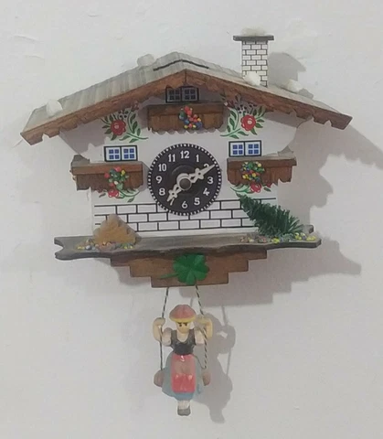 German Black Forest swing cuckoo clock with Quartz movement and cuckoo Cover