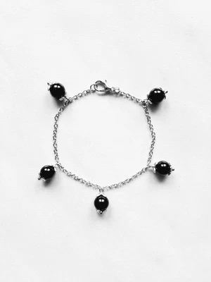 Bracciale Sardo da 15 cm con pendenti su coccu abegia in onice 8 mm - Immagine 1 di 2