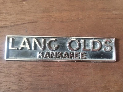 Placa de identificación con emblema de concesionario de automóviles Kankakee vintage LANG OLDS Foto 1 de 2
