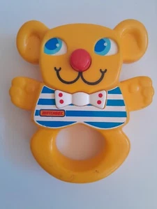 Vintage 1983 Matchbox 5.5" Yellow Plastic Teddy Bear Rattle Toy Baby Bow Tie - Picture 1 of 8
