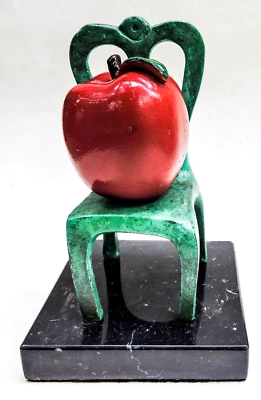 HELIODORO HERNANDEZ  BRONZE SCULPTURE APPLE ON CHAIR BLACK MARBLE BASE - Image 1 of 4