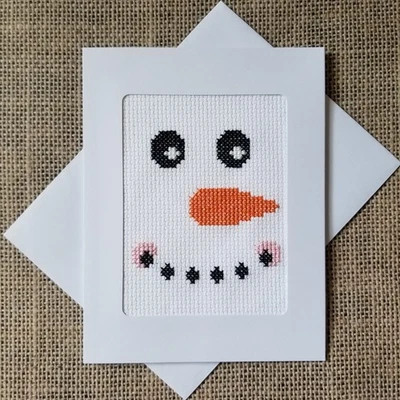 Tarjeta de nota en blanco con cara de muñeco de nieve punto de cruz terminada completa Foto 1 de 2