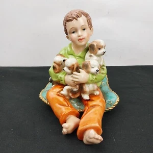 Porcelain Christmas Setting REPLACEMENT Child Boy Holding Puppies 4.5" Tall - Picture 1 of 14