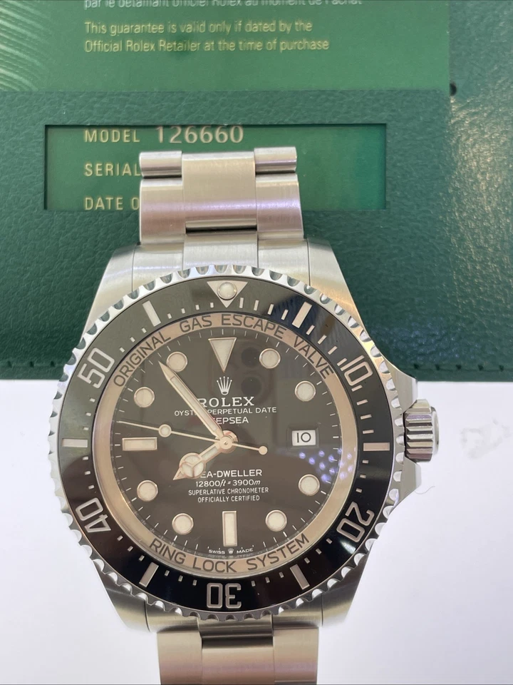 Rolex Sea Dweller 126600 43mm Box booklets and 2021 Warranty Card - Image 1 of 4