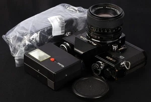 Fujica ST801 LED Black 35mm Film SLR + EBC Fujinon 55/1.8 Lens & 121BC Flash Kit - Picture 1 of 10