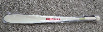 Cuerno de zapatos de plástico Kirin Beer 19" blanco roto/marfil hecho en Japón sellado nuevo Foto 1 de 4