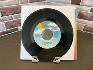 Lee Greenwood – Touch And Go Crazy MCA Records – MCA-53234 Vinyl, 7" - Bild 1 von 4
