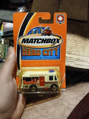 NIP NEW DIECAST MATCHBOX HERO CITY #15 MATTEL 67699: 1/64 SCALE AMBULANCE METRO  - Image 1 of 4