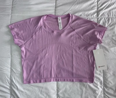 Novo Lululemon Feminino Tamanho 12 Swiftly Tech Cropped Manga Curta 2.0 Vita Rosa - Imagem 1 de 4