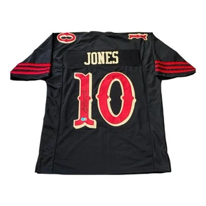 CAMISETA AUTOGRAFIADA FIRMADA POR MAC JONES DE LOS 49ERS DE SAN FRANCISCO CERTIFICADO DE AUTENTICIDAD BECKETT TESTIGO BAJO - Imagen 1 de 2