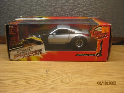 NISSAN 350Z A ESCALA 1/18 EN PLATA POR JOYRIDE-(RC-2-ERTL) # 37460 Foto 1 de 4