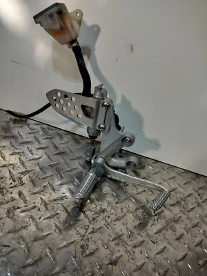 2004-2005 SUZUKI GSXR 600 OEM RIGHT SIDE DRIVER REARSET BRAKE SIDE - Image 1 of 4
