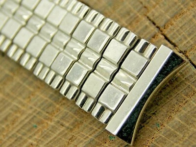 Correa de reloj de expansión Baldwin vintage de acero inoxidable NOS sin usar 16 mm con orejetas curvas para hombre Foto 1 de 3