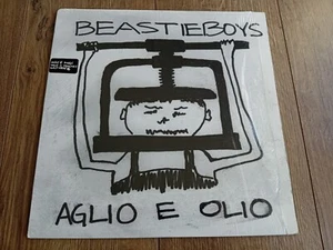BEASTIE BOYS - AGLIO E OLIO LP 1995 US INSERT COVER STILL IN SHRINK EX+ - Picture 1 of 6
