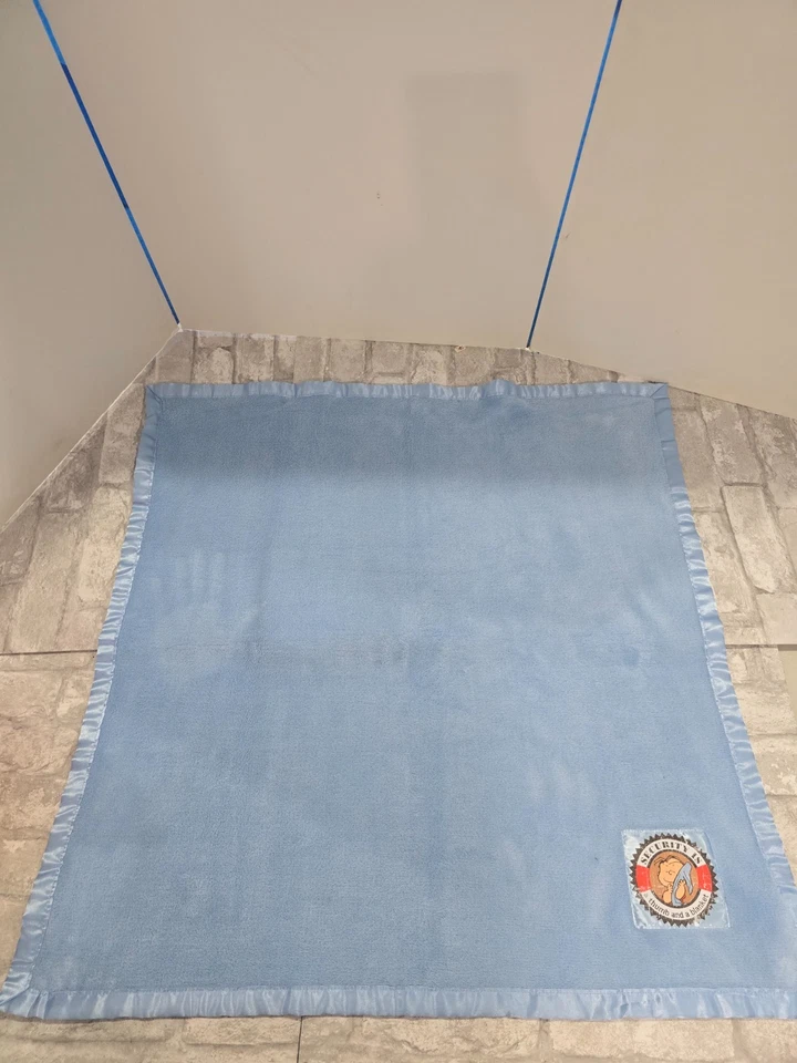 Manta azul felpa Peanuts Linus Security is a Thumb Lovey 29" x 29" satinado Foto 1 de 4