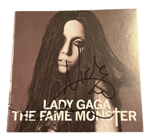 LADY GAGA signed (THE FAME MONSTER) Cd Cover autographed PSA/DNA Y72770 - Picture 1 of 2