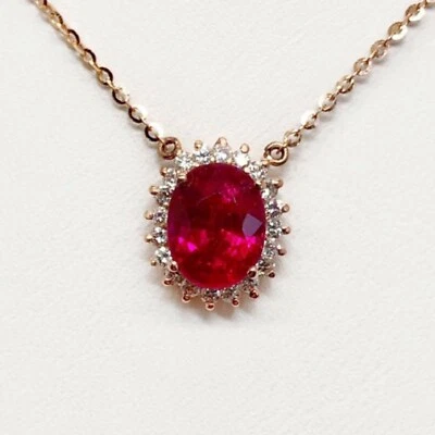 Colgante halo chapado en oro rosa de 14 quilates con rubí rojo simulado de corte ovalado de 3,15 quilates cadena de 18" Foto 1 de 4
