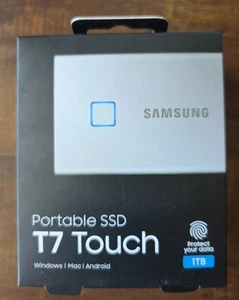 SSD externe portable Samsung T7 Touch 1 To - Argent (MU-PC1T0S/WW) Neuf, scellé - Photo 1/4