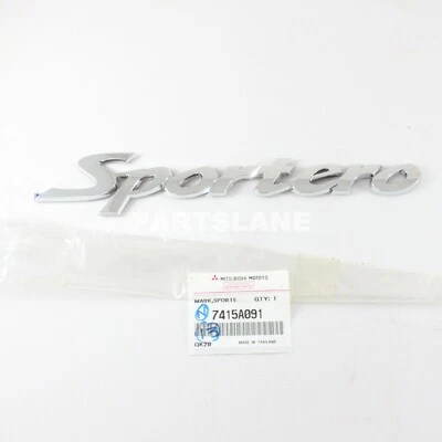 Mitsubishi L200 OEM genuino tres diapositivas emblema 7415A091 Foto 1 de 2