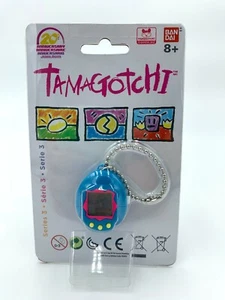 NIP Bandai 20th Anniversary Tamagotchi Virtual Pet Blue & Pink w/ Yellow Buttons - Picture 1 of 3