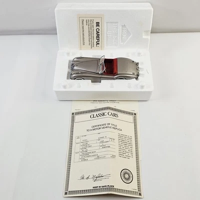 Jaguar XK120 1949 Danbury Mint escala 1:24 modelo de coche fundido a presión certificado de autenticidad plateado Foto 1 de 4