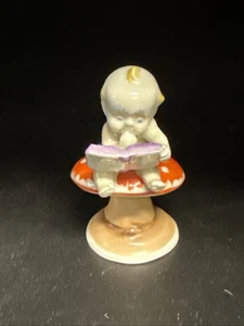 Vintage Metzler Ortloff Germany Kewpie on Mushroom Porcelain Child Reading Book - Picture 1 of 9