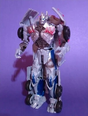 2014 Hasbro Transformers Flip and Change Silver Knight Optimus Prime 8.5" Loose - Image 1 of 4
