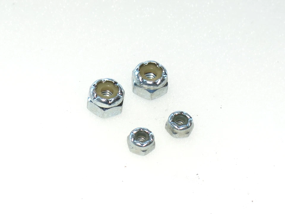 ASC6042 TEAM ASSOCIATED RC10 VINTAGE BUGGY METALLIC KIT LOCKING WHEEL NUTS - Image 1 of 1