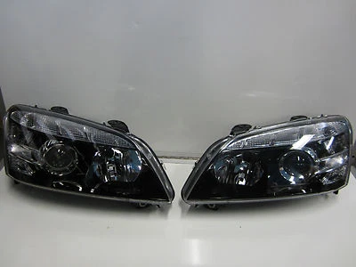 HOLDEN COMMODORE WM STATESMAN CAPRICE HEADLIGHT PAIR NEW LEFT AND RIGHT SIDE - Image 1 of 2