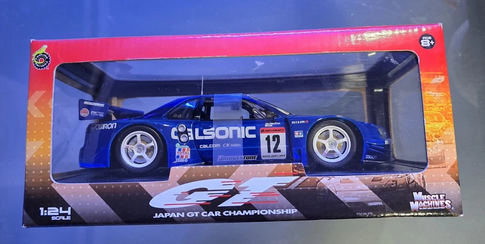 DIECAST MUSCLE MACHINES NISSAN GT-R CALSONIC SKYLINE 2003 SERIES 1:24 VGC - Image 1 of 4