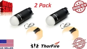 ThorFire Mini LED Schlüsselanhänger Taschenlampe superhell 120 Lumen 2er Pack. Verwendet CR123A - Bild 1 von 4
