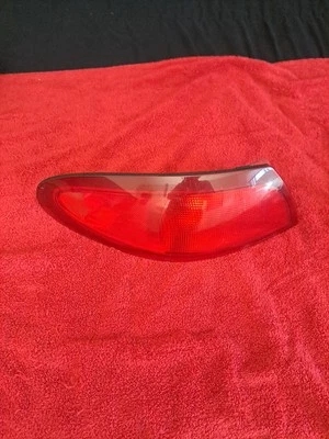 Левый задний фонарь для Ford Escort Mercury Tracer 1997 1998 годов выпуска от оригинального производителя задний фонарь для седана  - Изображение 1 из 4