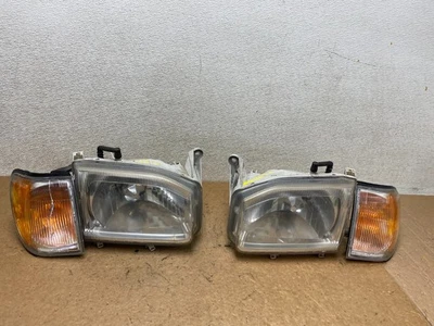 Faros izquierdo+derecho Nissan Pathfinder 1999-2004 + intermitente OEM S7826 DW Foto 1 de 4