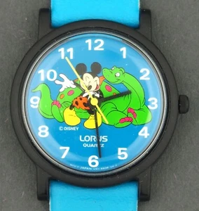 Reloj Lorus Cuarzo Disney Hombre de las Cavernas Mickey Mouse Personaje Dinosaurio Estuche 31mm - Imagen 1 de 3