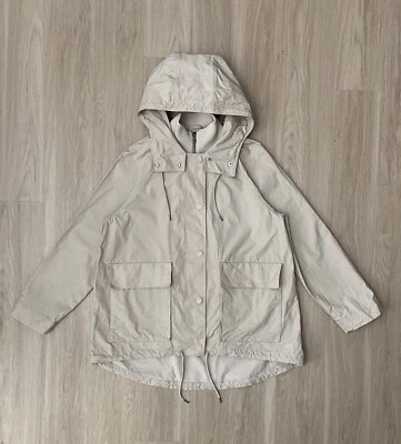 Chaqueta utilitaria COS para mujer pequeña beige blanco roto con capucha en capas de algodón Parka Foto 1 de 4