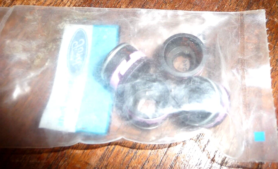 NOS 1985 1986 FORD MUSTANG 2.3L E VEDAÇÕES DE HASTE DE VÁLVULA SVO E5ZZ-6571-UM CONJUNTO DE 4x - Imagem 1 de 1