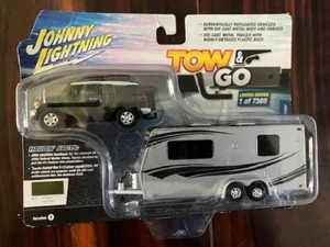 2023 JOHNNY LIGHTNING TOW & GO 2010 TOYOTA FJ CRUISER WITH CAMPING TRAILER REL 1 - Picture 1 of 1