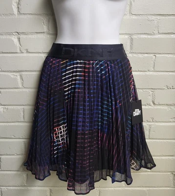 Nueva Falda Corta DKNY Plisada Transparente Abstracta Geométrica Talla XS Precio de venta sugerido por el fabricante 89 USD Foto 1 de 4