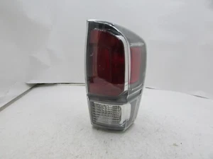 2016-2017 TOYOTA TACOMA SILVER TRIM FACTORY OEM RIGHT BULB TYPE TAIL LIGHT B1 - Picture 1 of 4