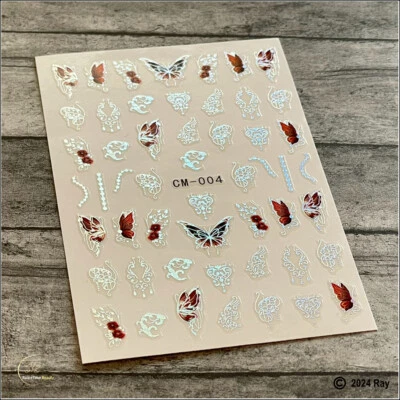 Calcomanías de uñas con láser a rayas de perlas mariposa plateadas flores mariposa Foto 1 de 2