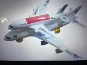 aeroplanes tow aeroplane with docked each other - Picture 1 of 3