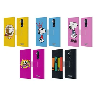 FUNDA LIBRO DE CUERO OFICIAL PEANUTS THE MANY FACES OF SNOOPY PARA TELÉFONOS NOKIA Foto 1 de 4