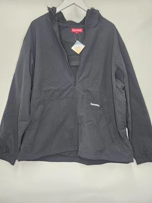 CHAQUETA CON CAPUCHA CREMALLERA REFLECTANTE SUPREMA SS21 / NEGRA / TALLA XL Foto 1 de 4