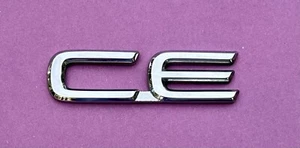 1998-2002 98 99 00 01 02 Toyota Corolla CE Rear Script Emblem OEM 75444-1A260 - Picture 1 of 3